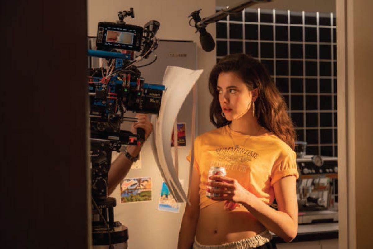 The camera angles in on Qualley for a scene set inside Elisabeth/Sue’s sun-soaked apartment.